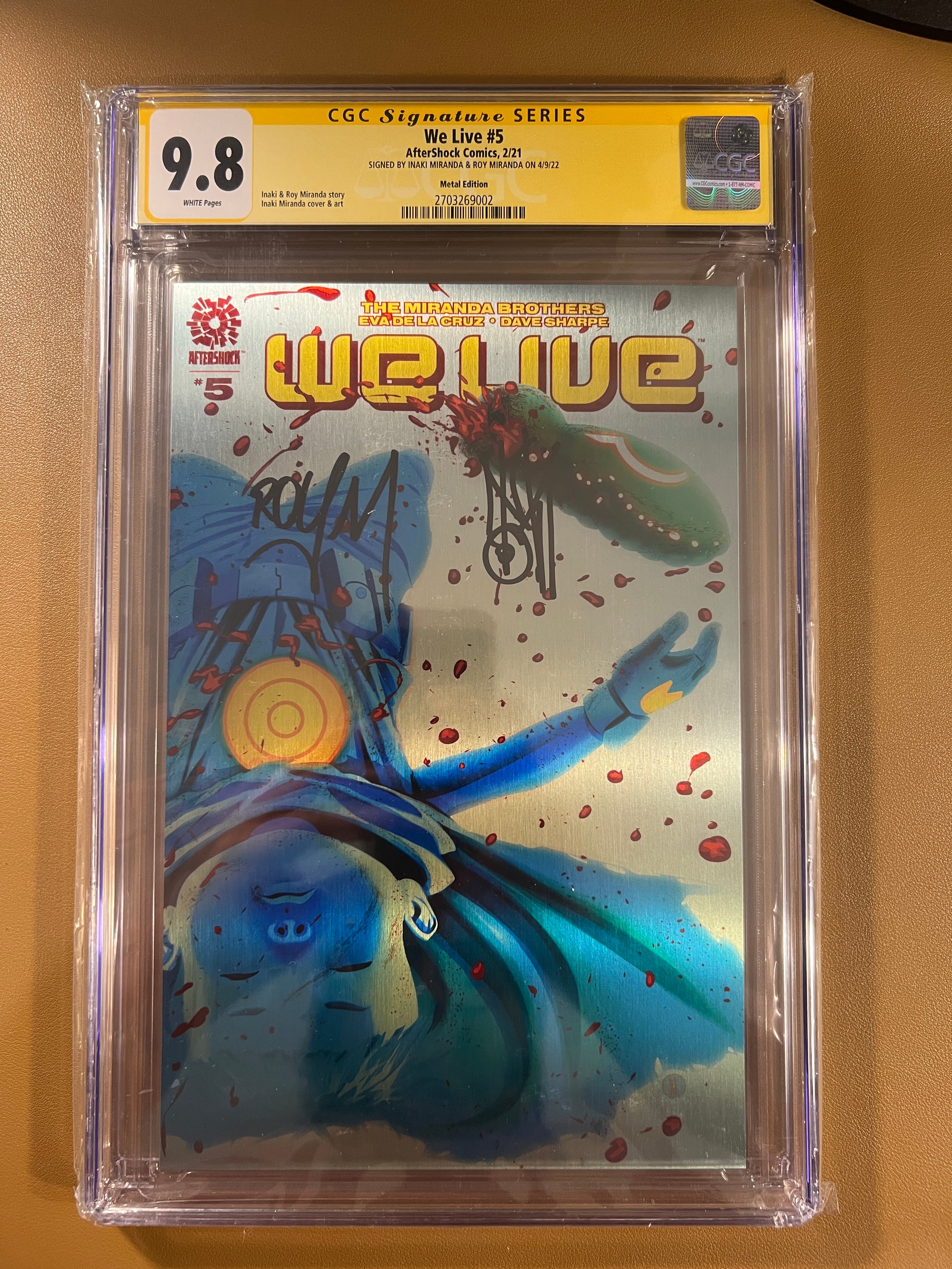 WE LIVE #5 — CGC 9.8 (METAL COVER) SIGNED BY IÑAKI MIRANDA & ROY MIRANDA