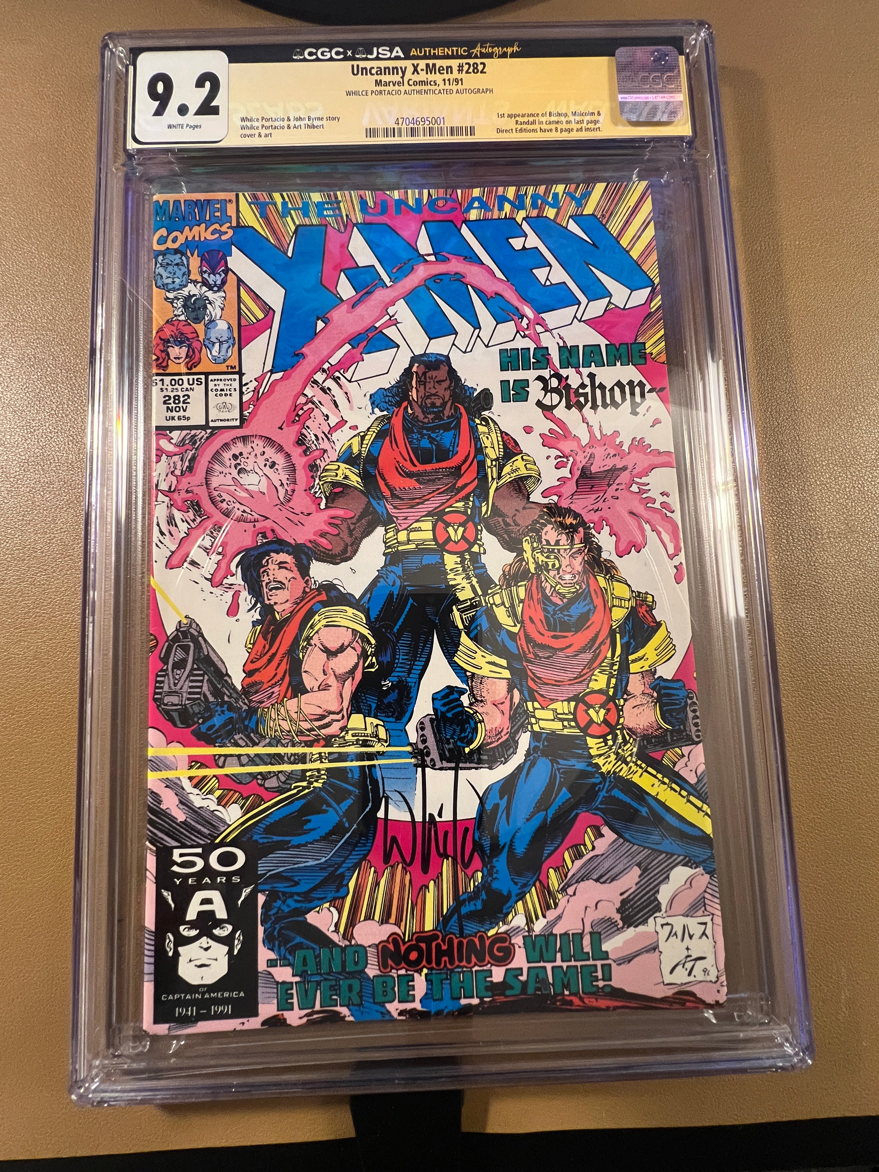 X-Men #282 CGC 9.2 Signed Whilce Portacio Bishop 1st App Marvel 1991